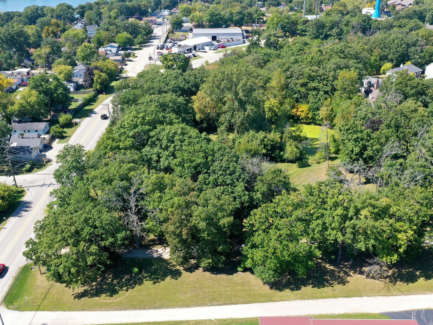 18238 West Gages Lake Road Grayslake, IL 60030 - Photo 2 of 18 an aerial view of residential house with outdoor space and trees all around