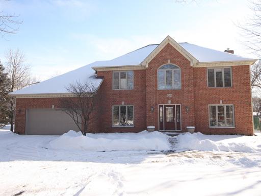 1044 Parkside Road Naperville, IL 60540 - Photo 1 of 1 a front view of a house with a yard