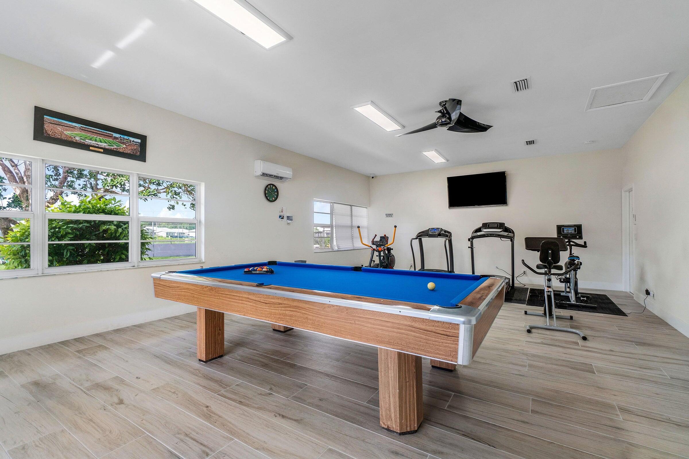 14250 Nesting Way, Unit B Delray Beach, FL 33484 - Photo 42 of 45 a room with furniture pool table and windows
