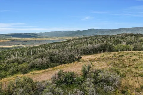 a view of lake and mountain