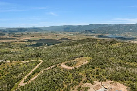 a view of an ocean and a mountain
