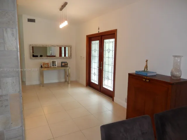 a view of living room and kitchen with furniture