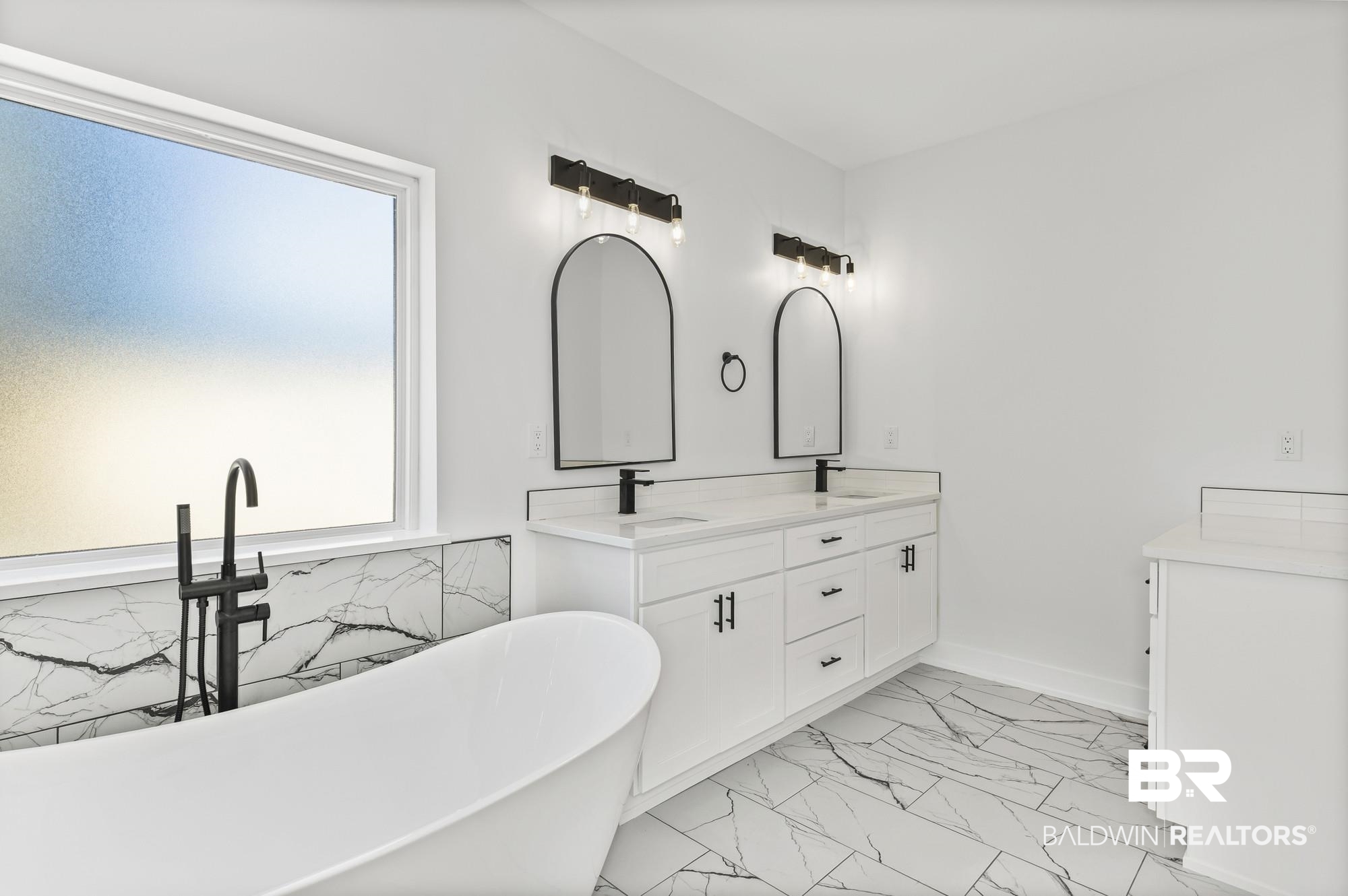 10180 Pineview Drive Foley, AL 36535 - Photo 20 of 47 Full bathroom featuring light marble finish flooring, double vanity, and a soaking tub