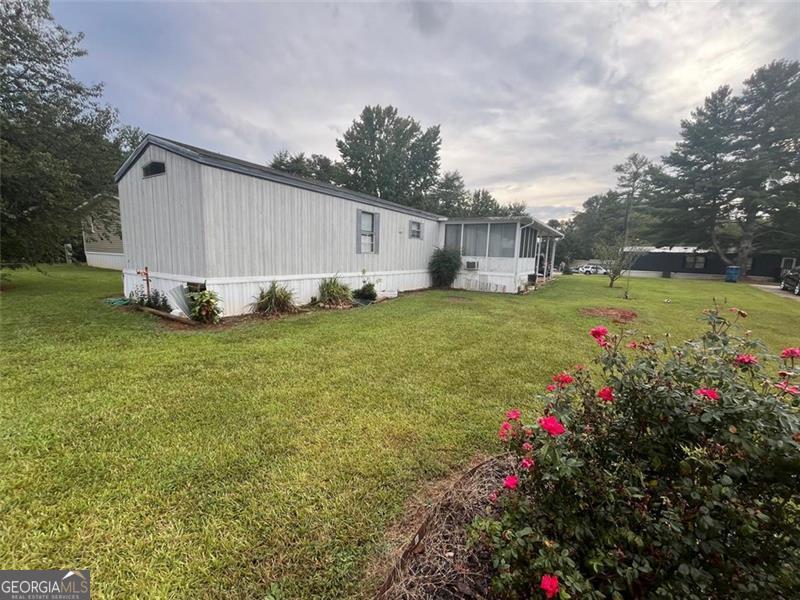 a view of a backyard with garden