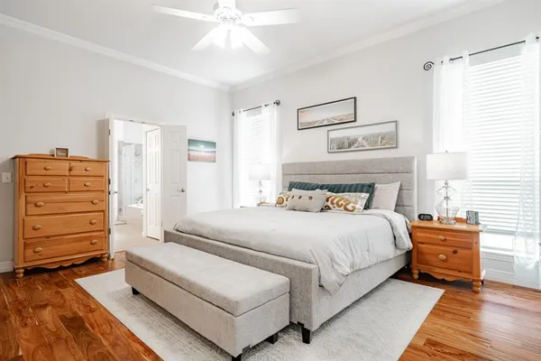 a bedroom with a bed and a cabinets