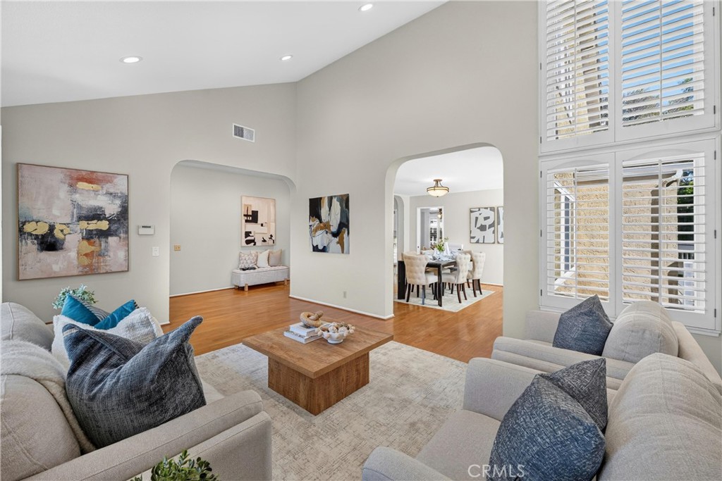 2935 Bluebell Avenue Brea, CA 92821 - Photo 4 of 38 Step inside to a spacious living room filled with natural light and highlighted by soaring ceilings