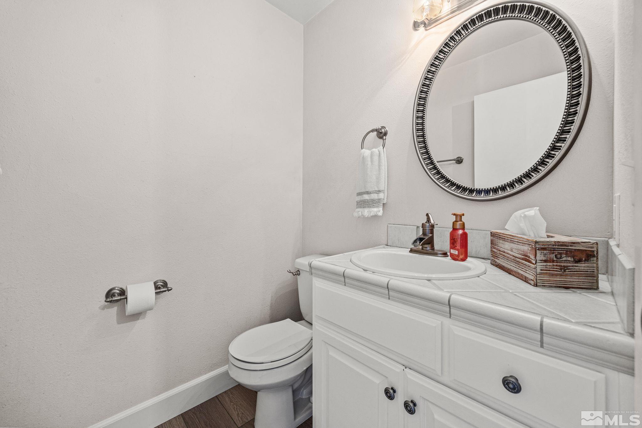 3829 Kings Row Reno, NV 89503 - Photo 20 of 40 a bathroom with a sink and a mirror
