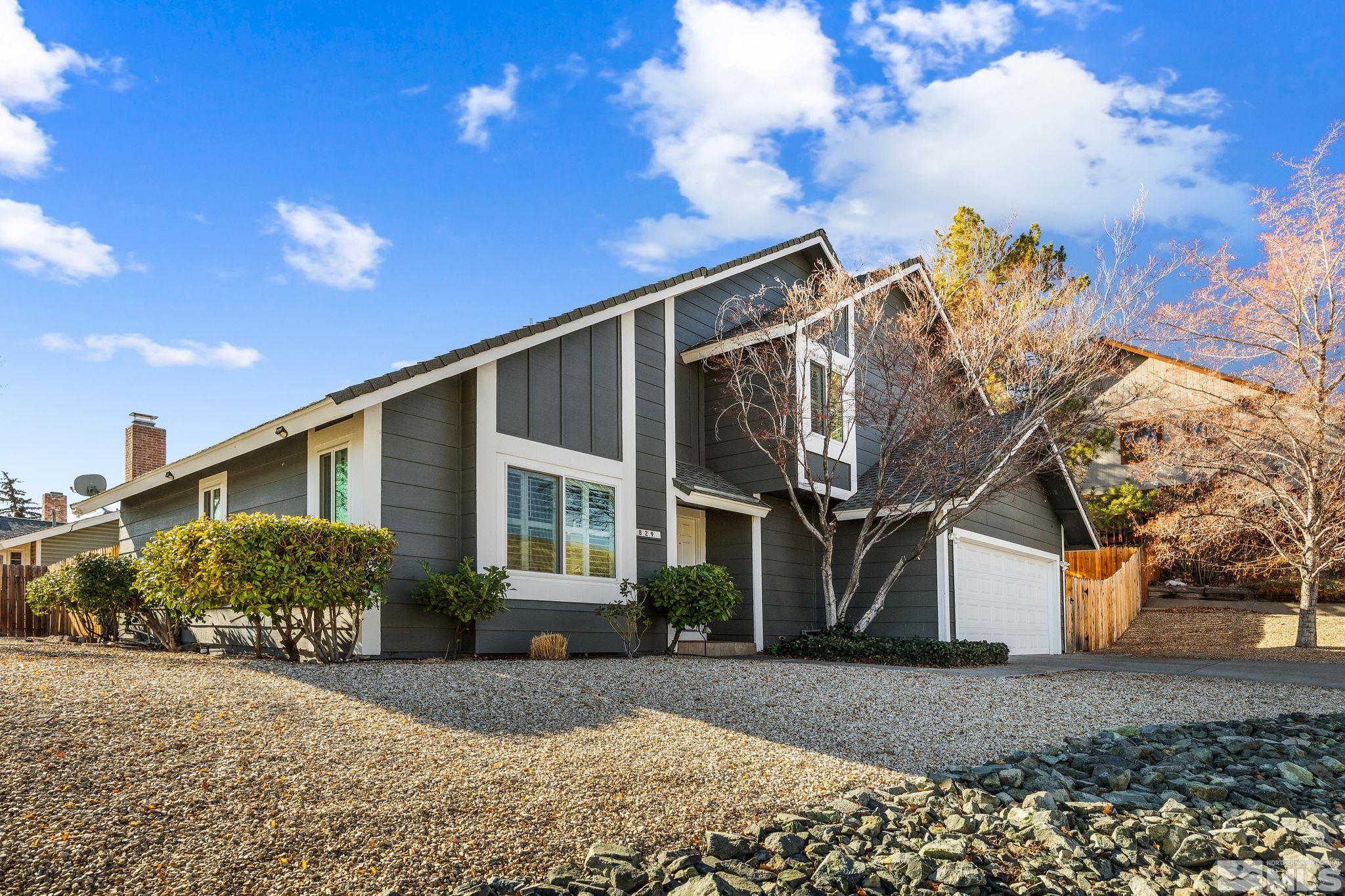 3829 Kings Row Reno, NV 89503 - Photo 3 of 40 a view of a house with a yard