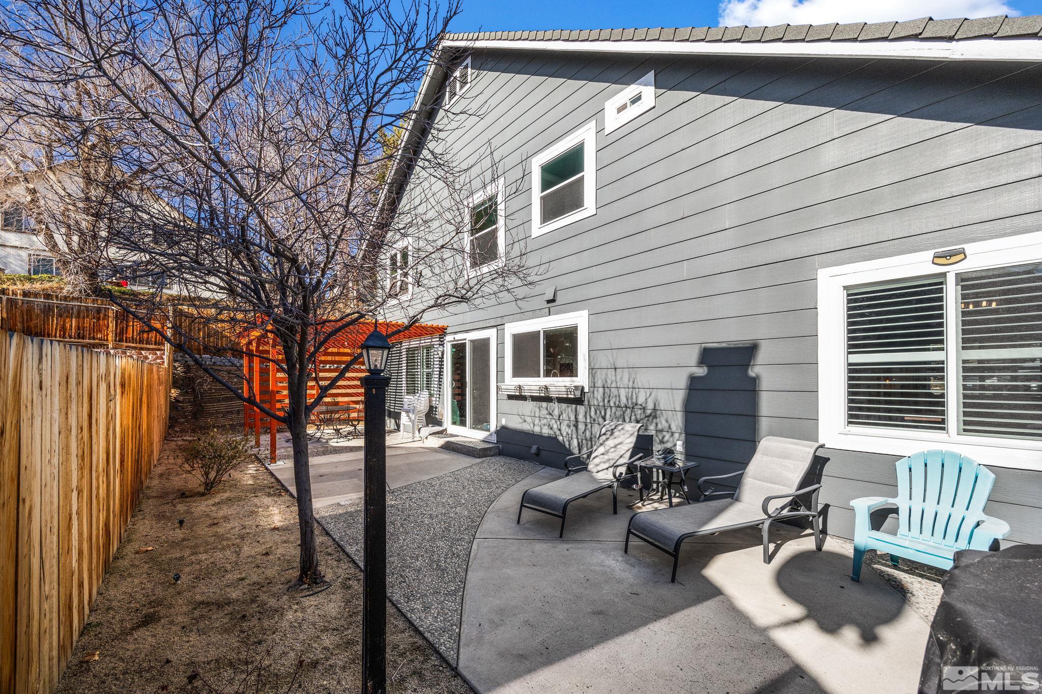 3829 Kings Row Reno, NV 89503 - Photo 34 of 40 a view of a house with backyard and sitting area