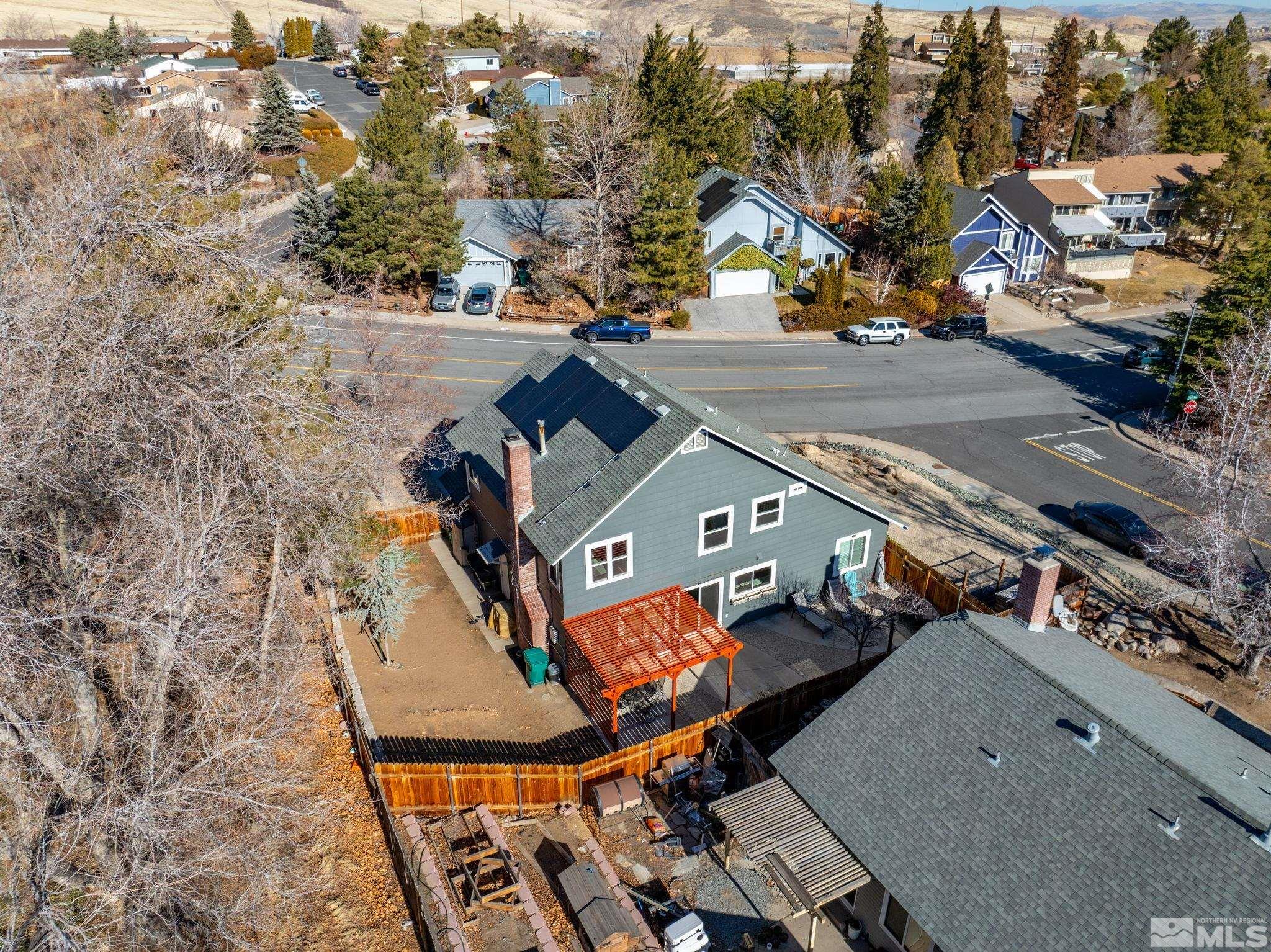 3829 Kings Row Reno, NV 89503 - Photo 35 of 40 an aerial view of a house with a mountain
