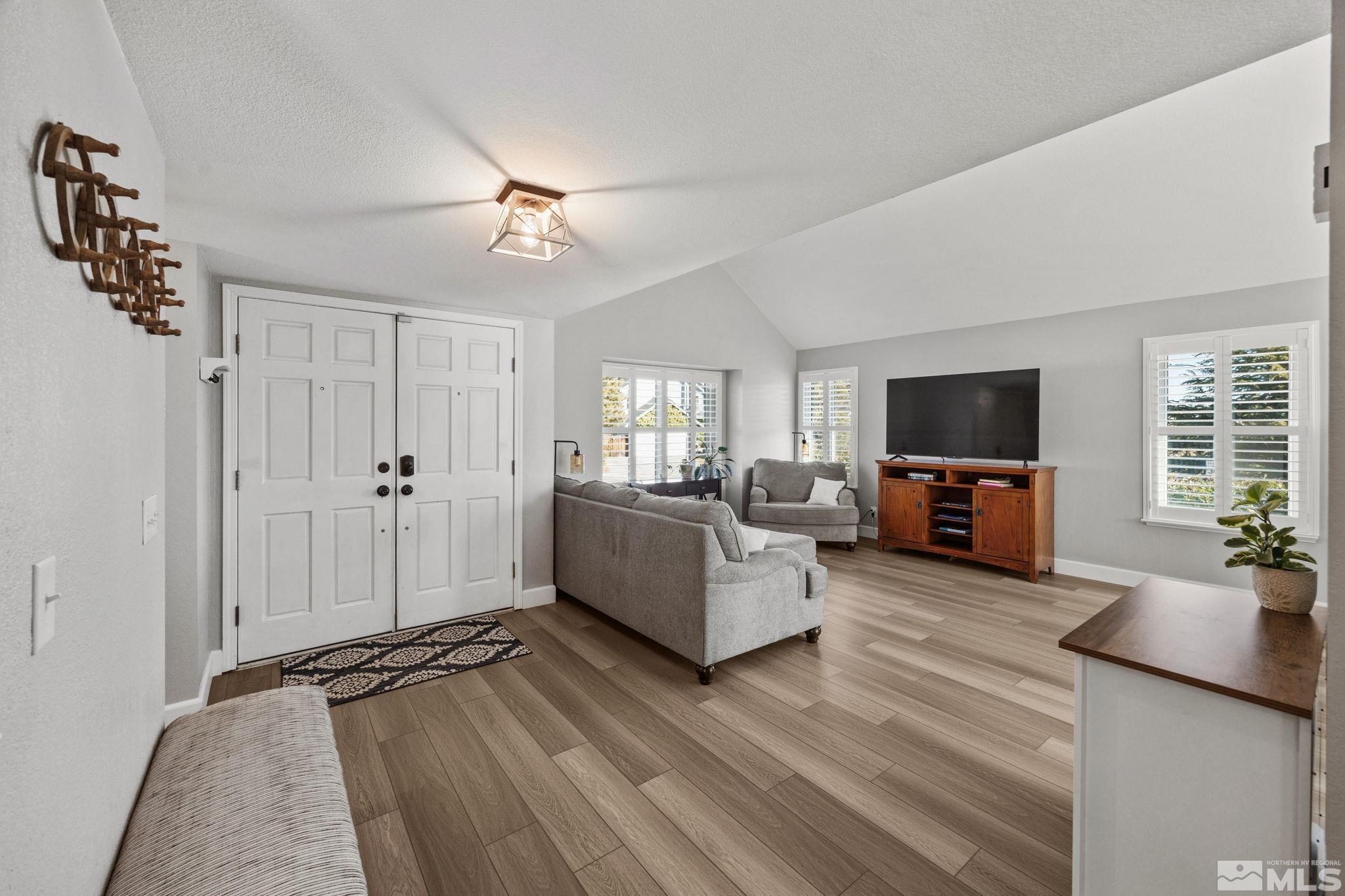 3829 Kings Row Reno, NV 89503 - Photo 7 of 40 a living room with furniture and a flat screen tv