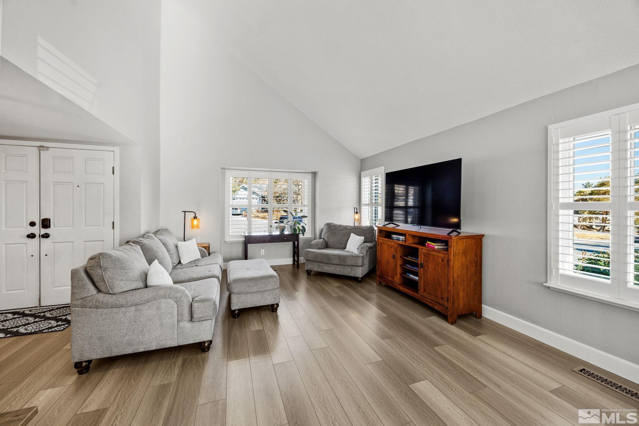 3829 Kings Row Reno, NV 89503 - Photo 9 of 40 a living room with furniture and a flat screen tv