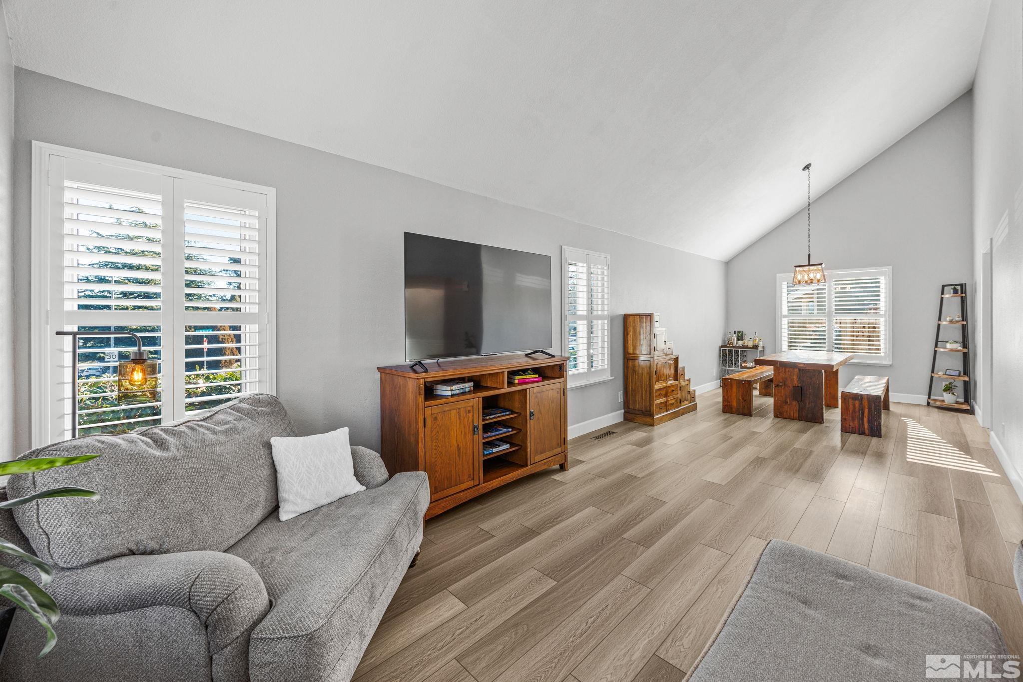 3829 Kings Row Reno, NV 89503 - Photo 10 of 40 a living room with furniture and a flat screen tv
