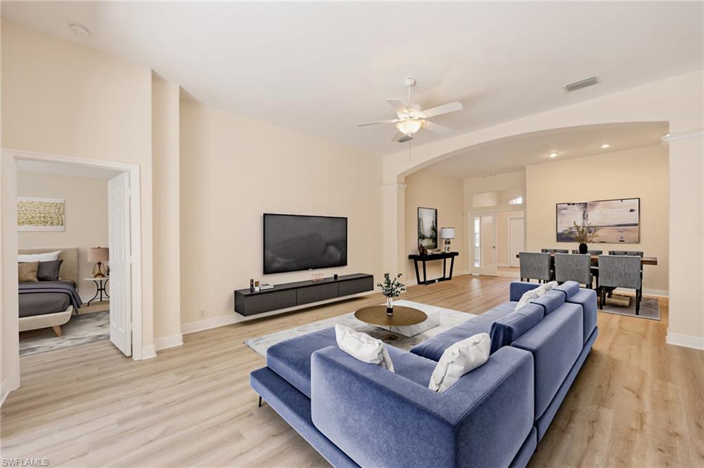 20411 Rookery Drive Estero, FL 33928 - Photo 1 of 29 Virtual staged Living room featuring ceiling fan and light hardwood / wood-style floors