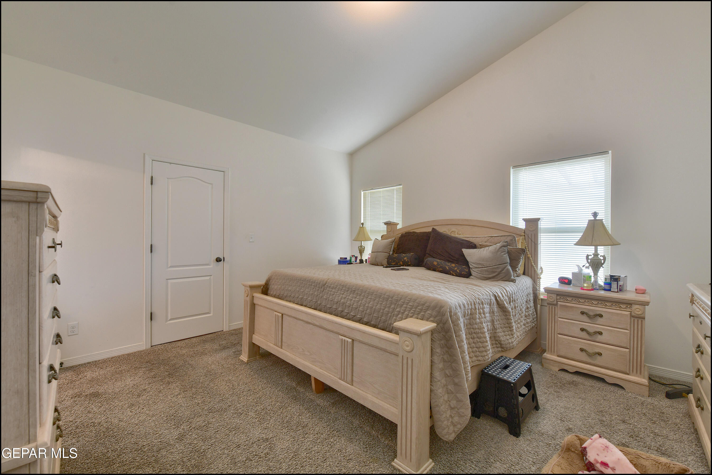 235 Herts Way El Paso, TX 79928 - Photo 17 of 35 a bedroom with a bed and a closet