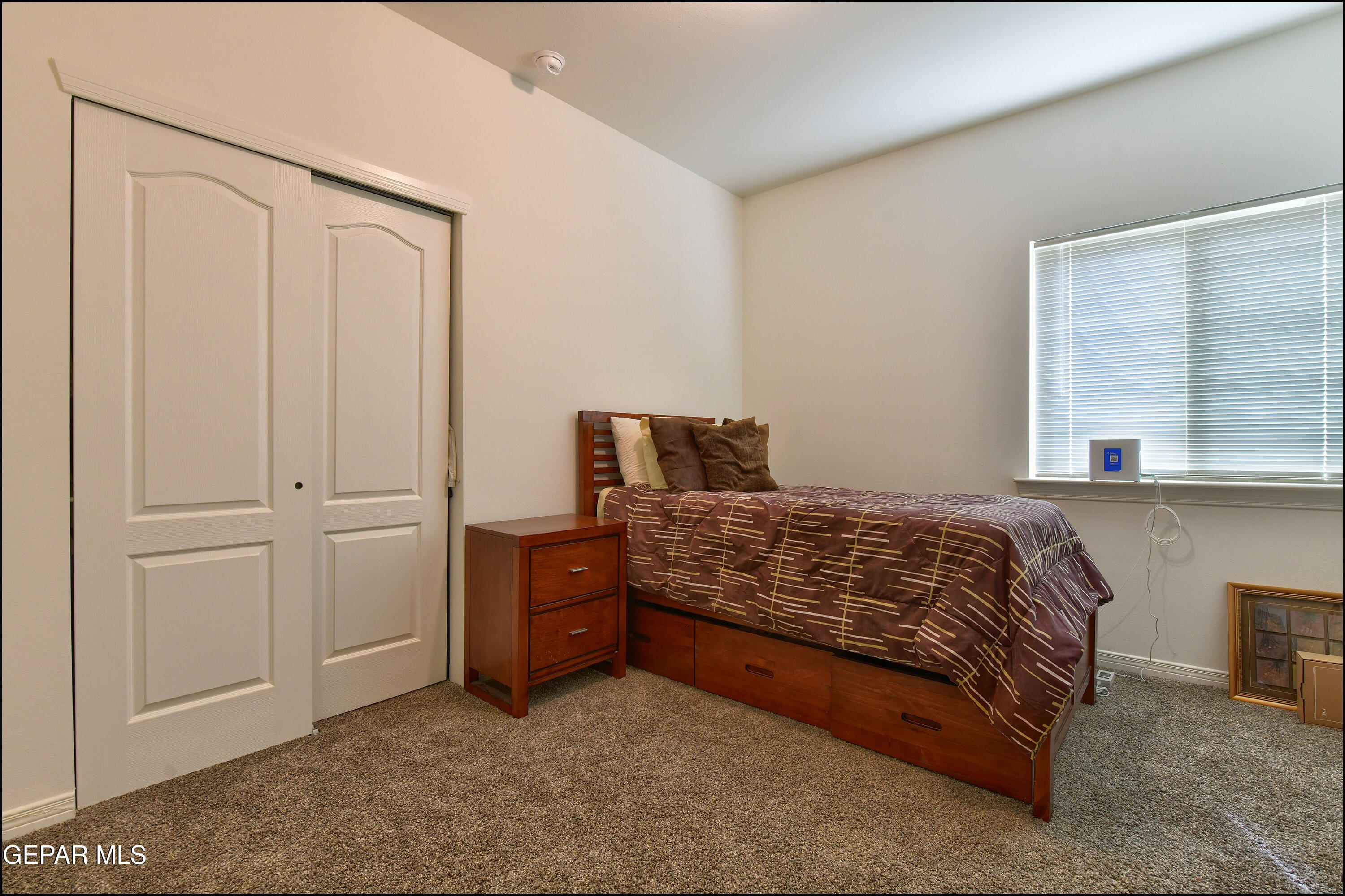 235 Herts Way El Paso, TX 79928 - Photo 22 of 35 a bedroom with a bed and cabinets