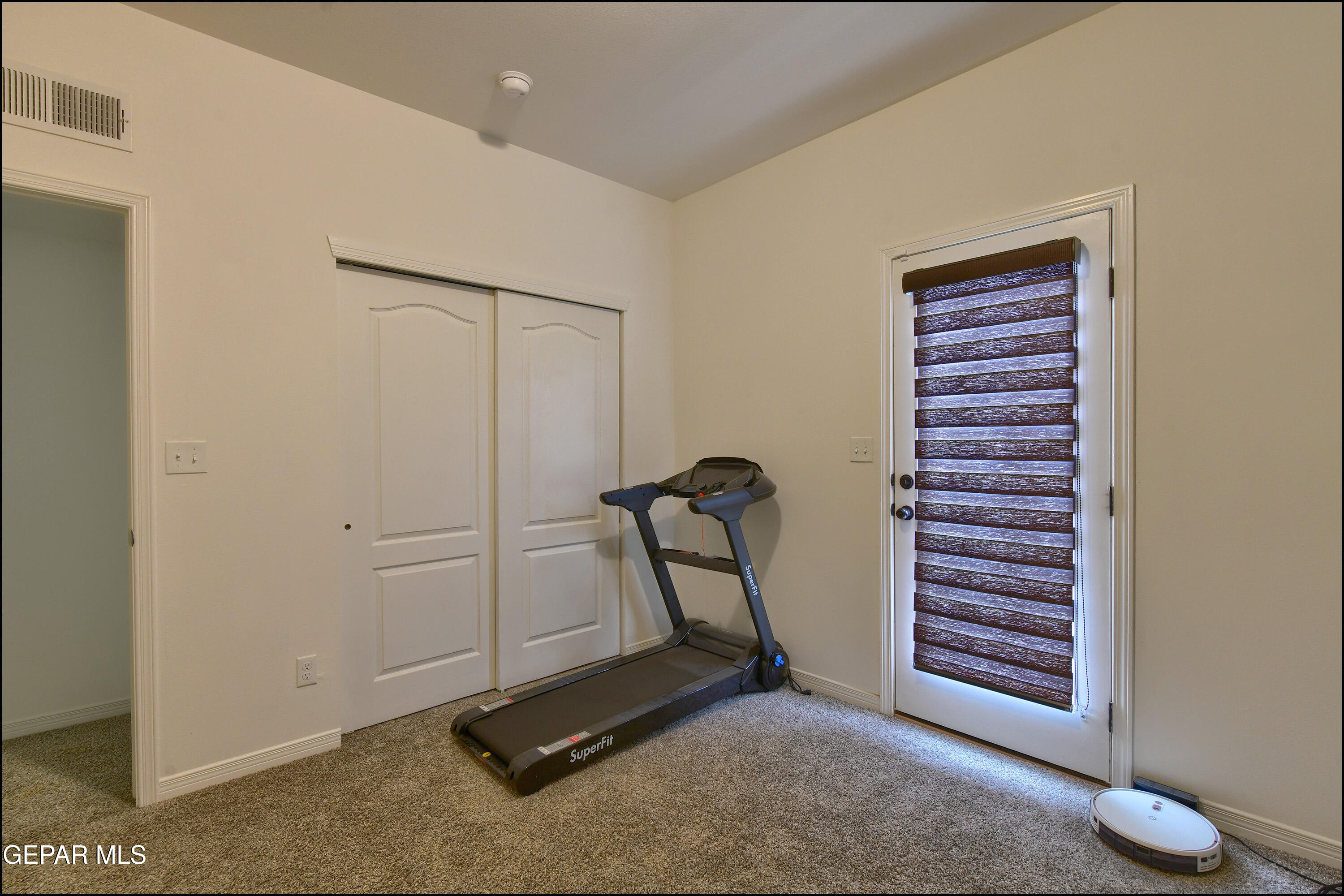 235 Herts Way El Paso, TX 79928 - Photo 26 of 35 a view of a room with gym equipment