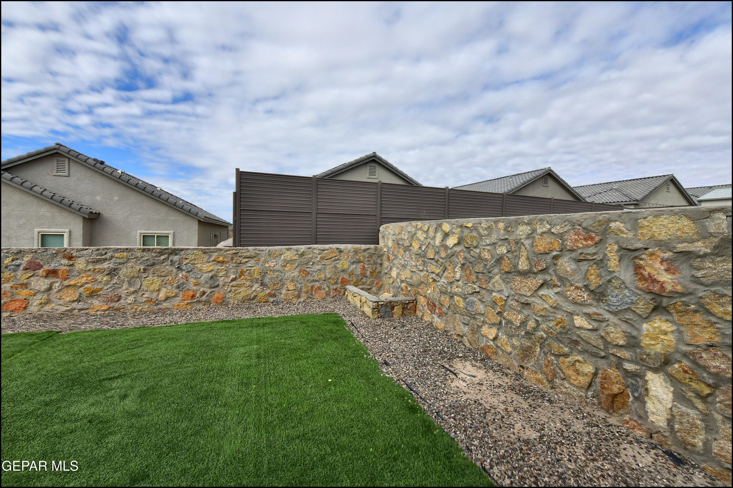 235 Herts Way El Paso, TX 79928 - Photo 27 of 35 a front view of house with garden