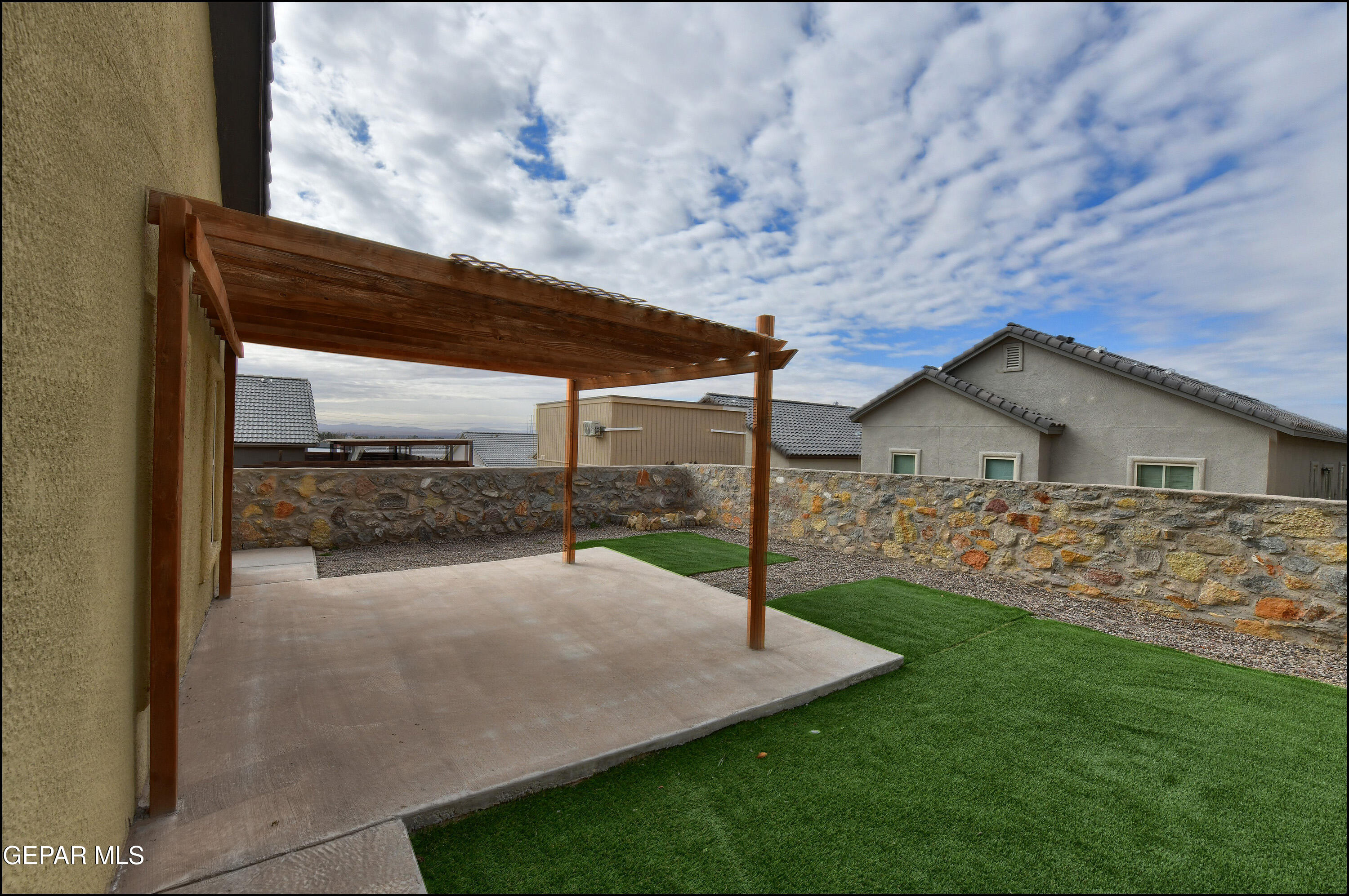 235 Herts Way El Paso, TX 79928 - Photo 28 of 35 a view of a house with backyard and garden