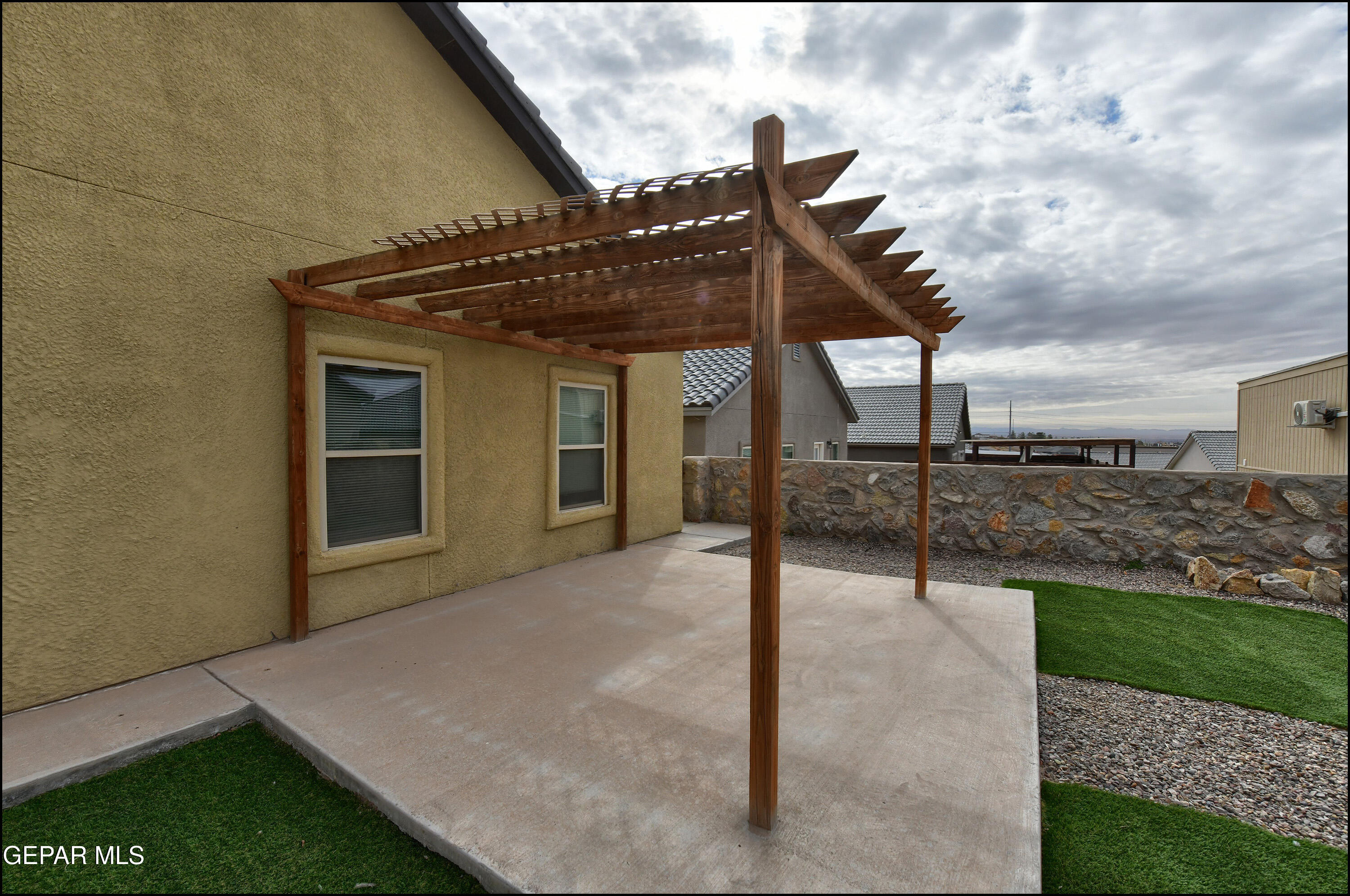235 Herts Way El Paso, TX 79928 - Photo 29 of 35 a front view of a house with a yard