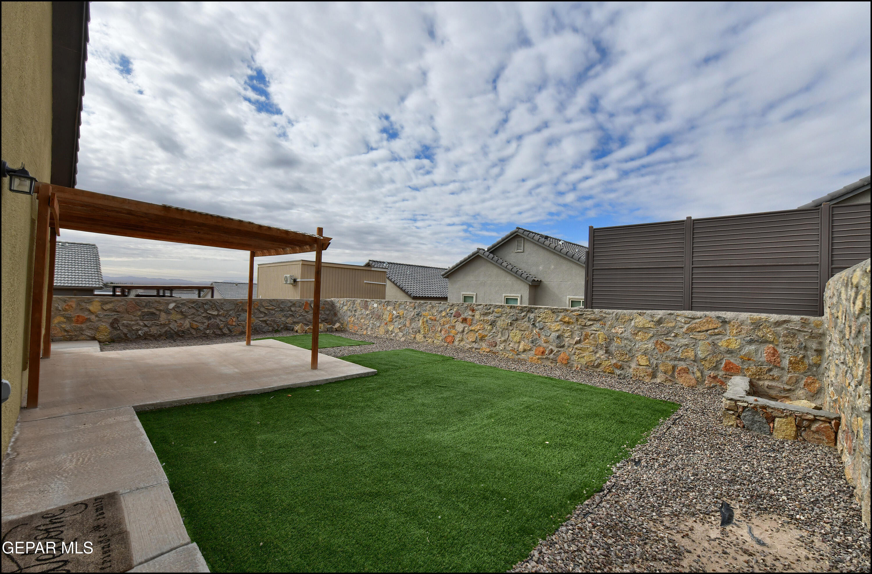 235 Herts Way El Paso, TX 79928 - Photo 30 of 35 a view of yard with patio