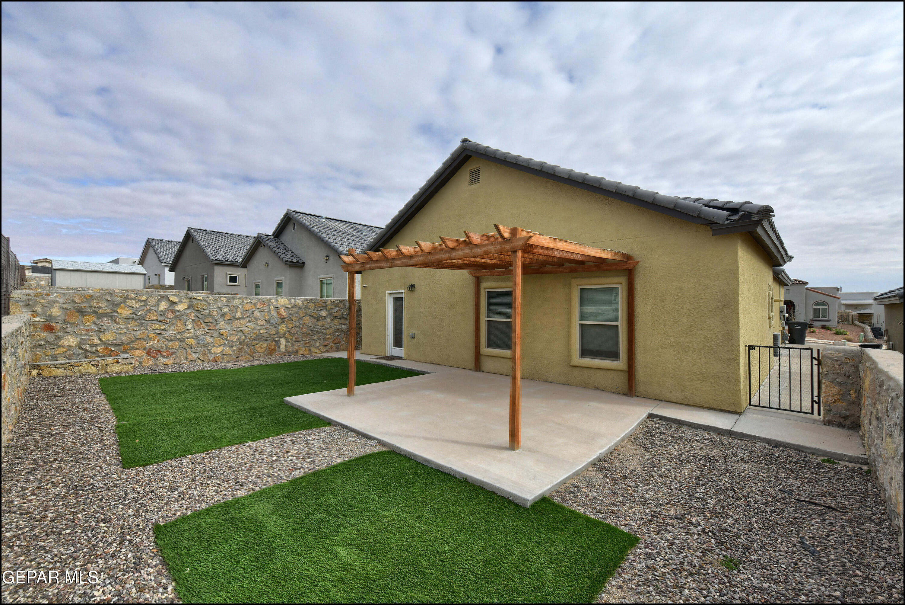 235 Herts Way El Paso, TX 79928 - Photo 32 of 35 a front view of a house with a yard