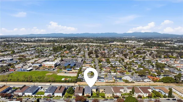 an aerial view of a city with lots of residential buildings