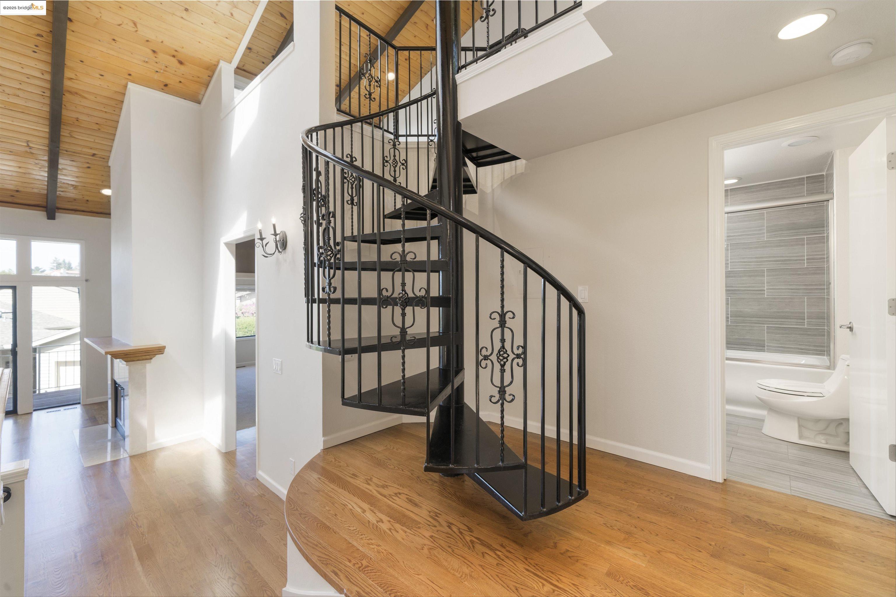 1881 Grand View Drive Oakland, CA 94618 - Photo 23 of 54 a view of entryway and hall with wooden floor