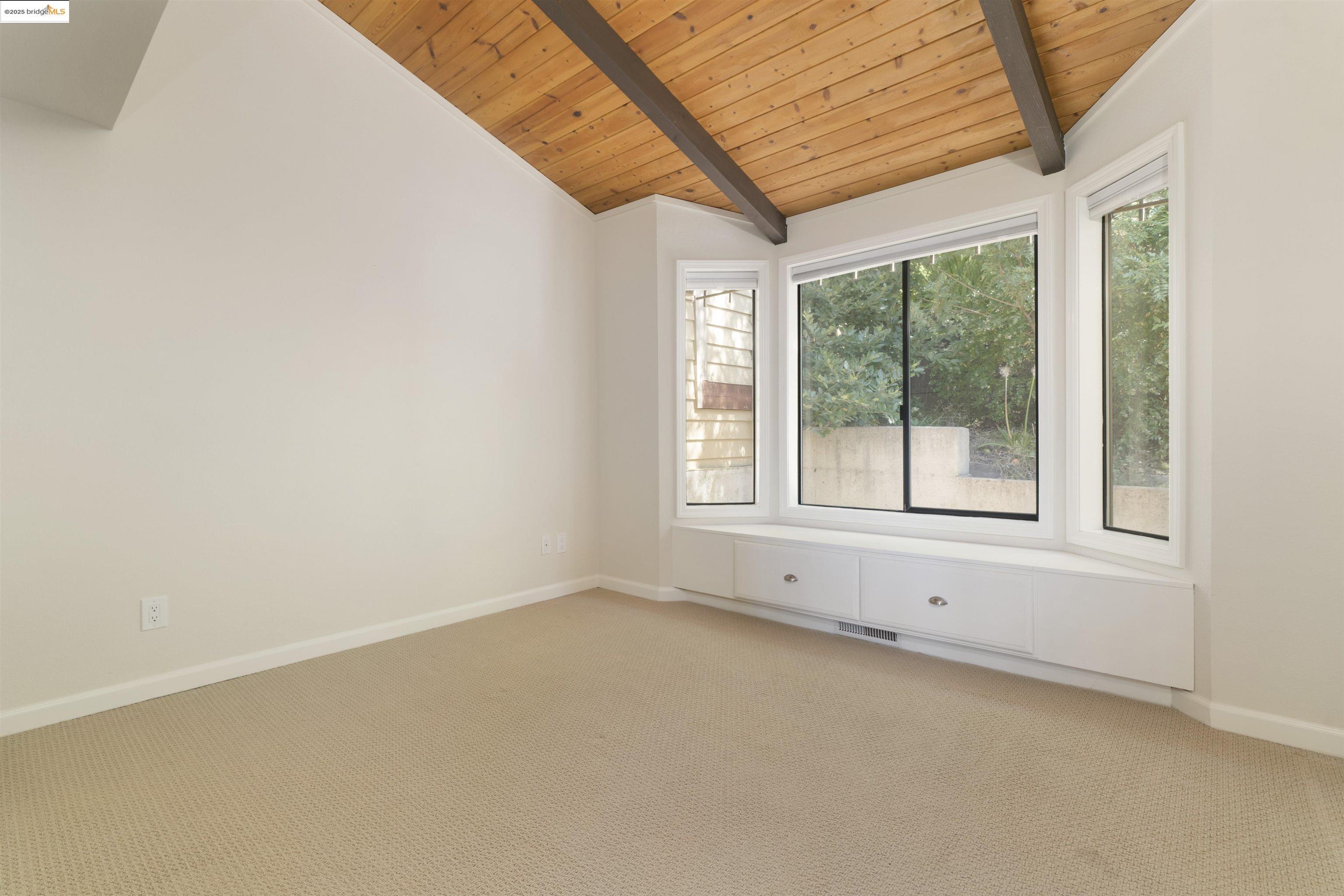 1881 Grand View Drive Oakland, CA 94618 - Photo 25 of 54 an empty room with a window