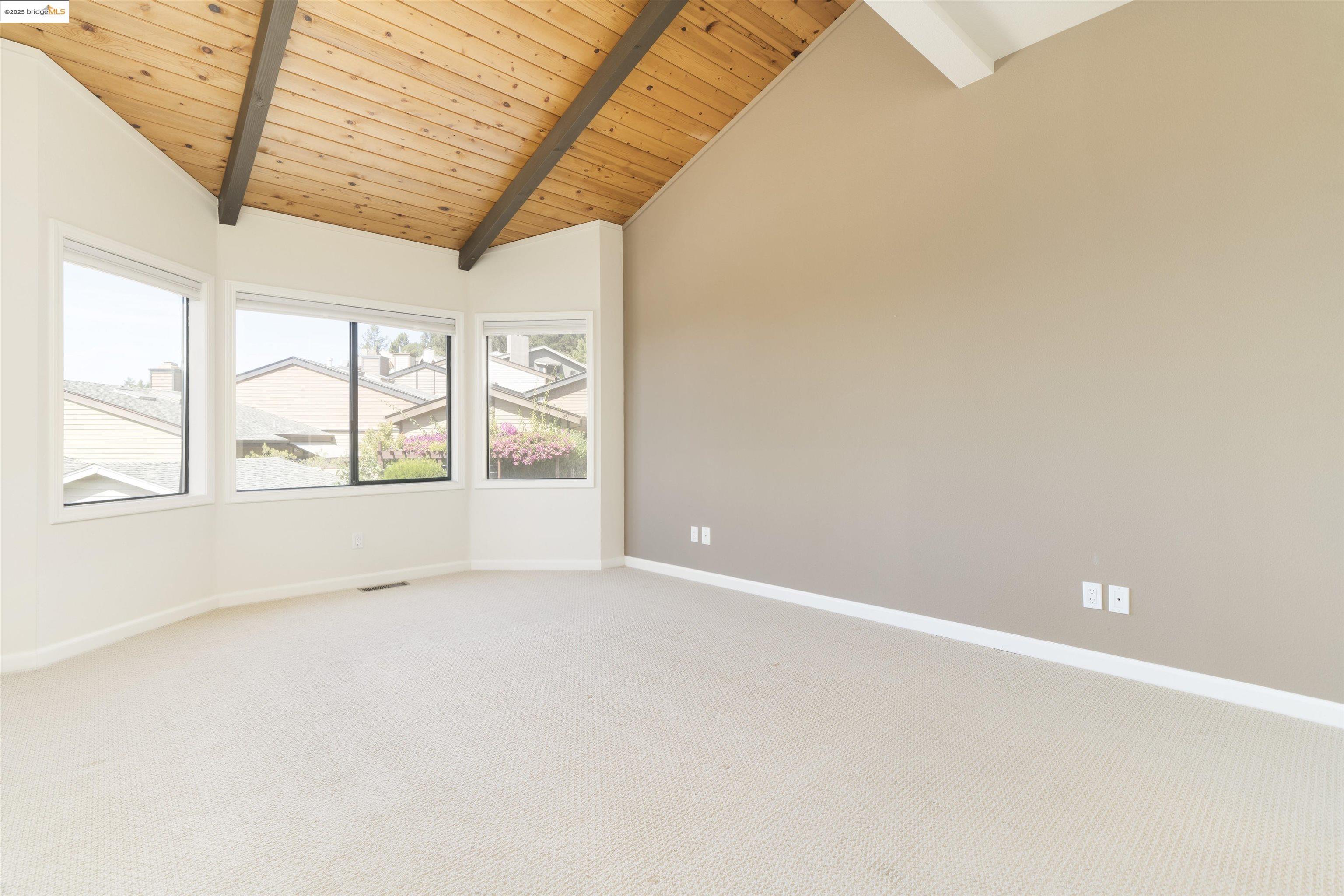 1881 Grand View Drive Oakland, CA 94618 - Photo 32 of 54 an empty room with windows