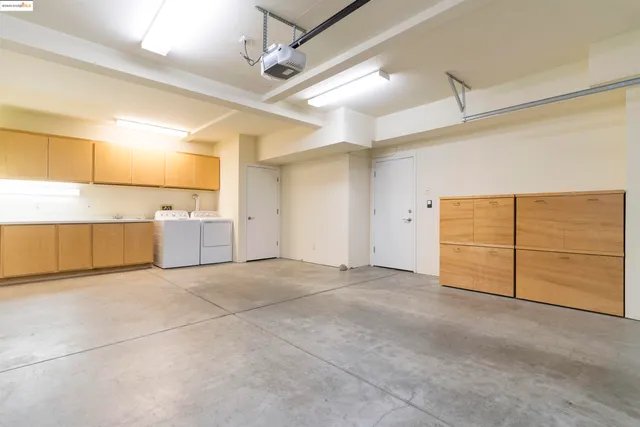 a view of a roof deck with wooden floor and fence