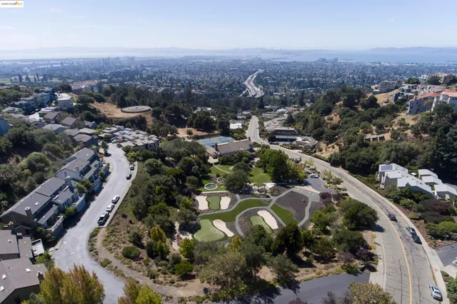 an aerial view of a house with a garden