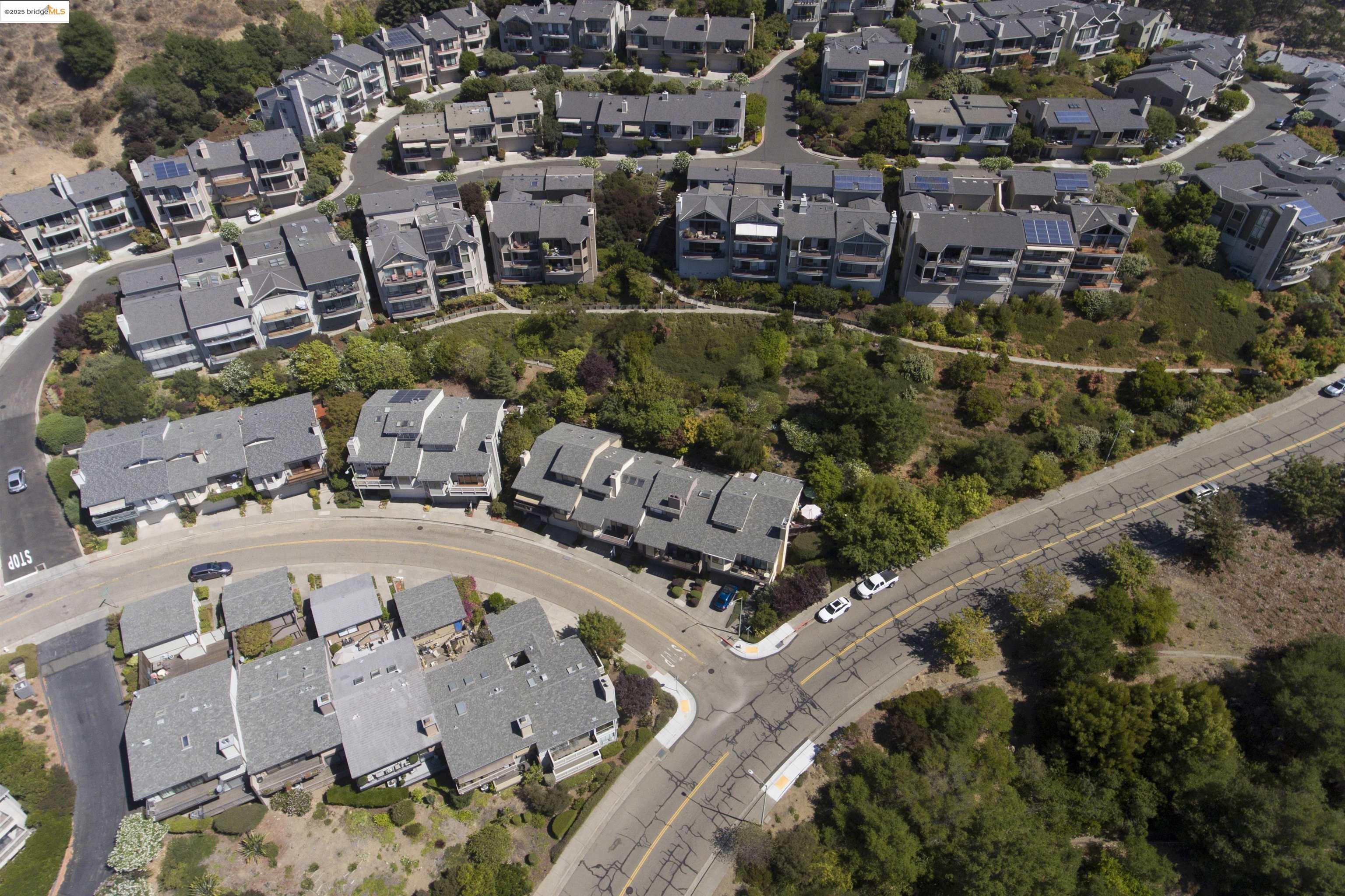 1881 Grand View Drive Oakland, CA 94618 - Photo 49 of 54 an aerial view of a house with a garden