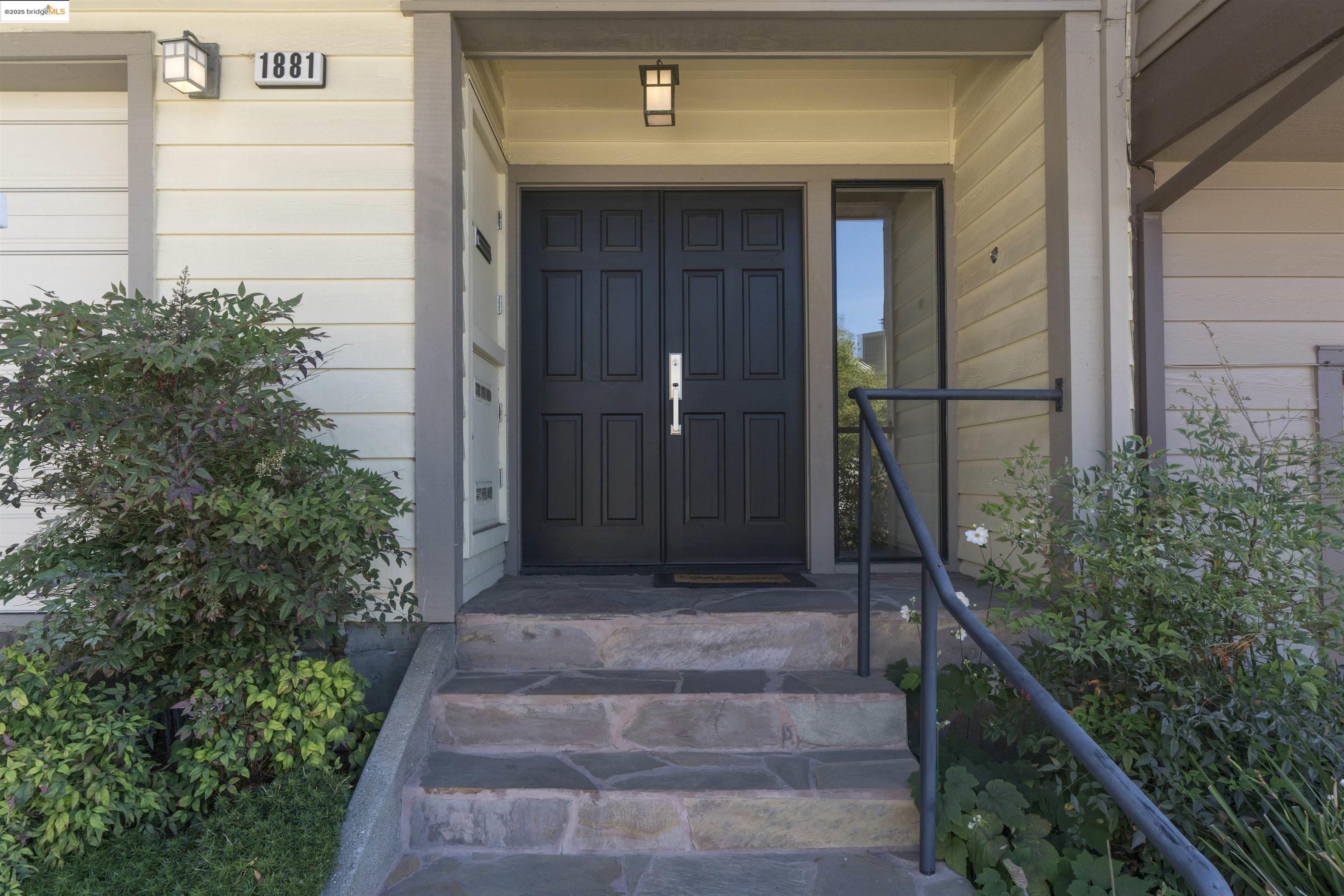 1881 Grand View Drive Oakland, CA 94618 - Photo 5 of 54 a front view of a house with plants