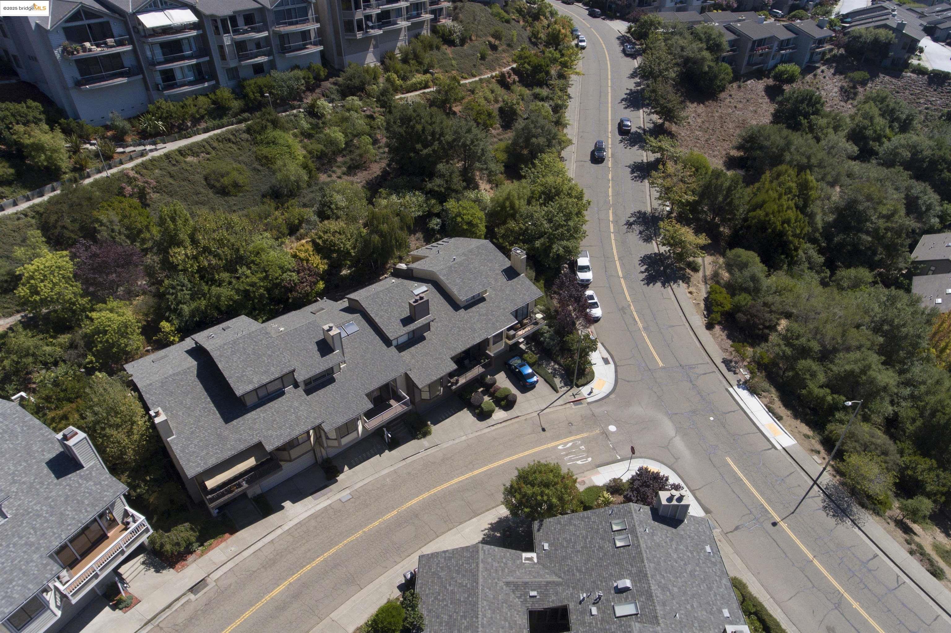 1881 Grand View Drive Oakland, CA 94618 - Photo 51 of 54 an aerial view of a house with a yard