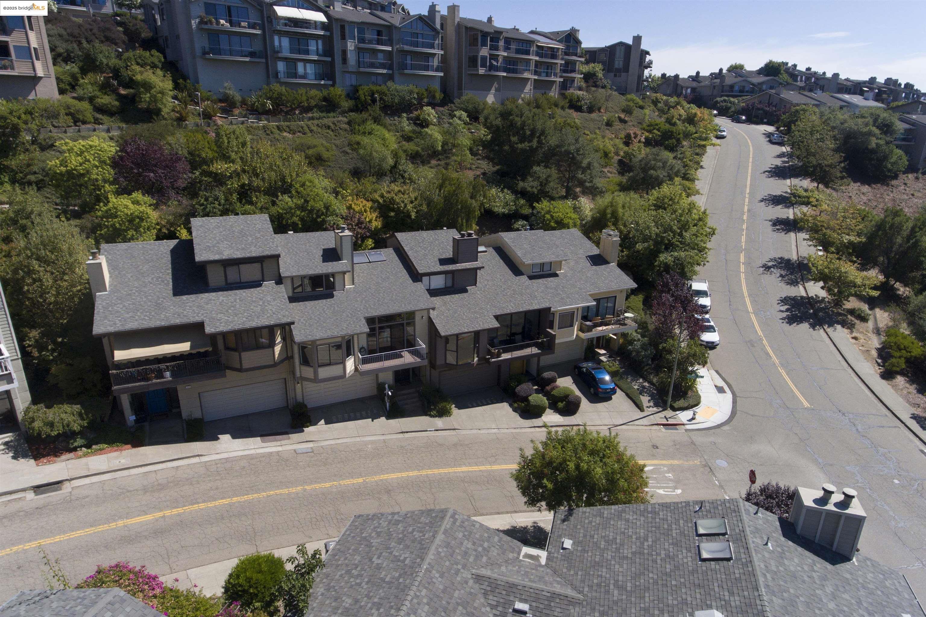 1881 Grand View Drive Oakland, CA 94618 - Photo 52 of 54 an aerial view of a house with a parking space