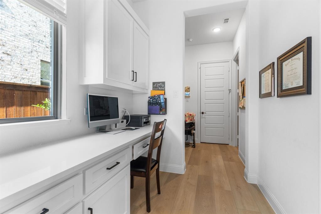 1898 Tumblegrass Road Frisco, TX 75033 - Photo 29 of 40 a kitchen with a cabinets appliances and a window