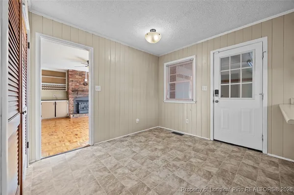 a kitchen with stainless steel appliances granite countertop a refrigerator sink and cabinets