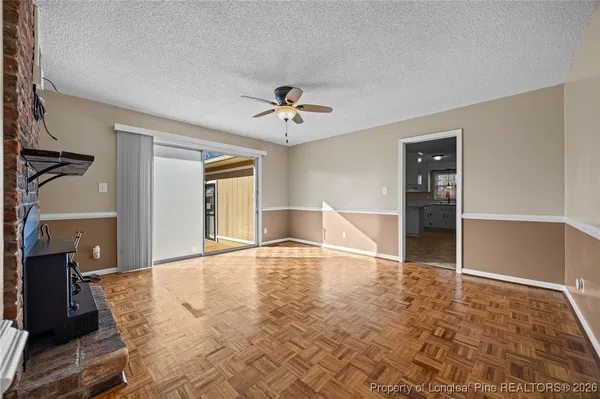a view of a hallway with a chandelier