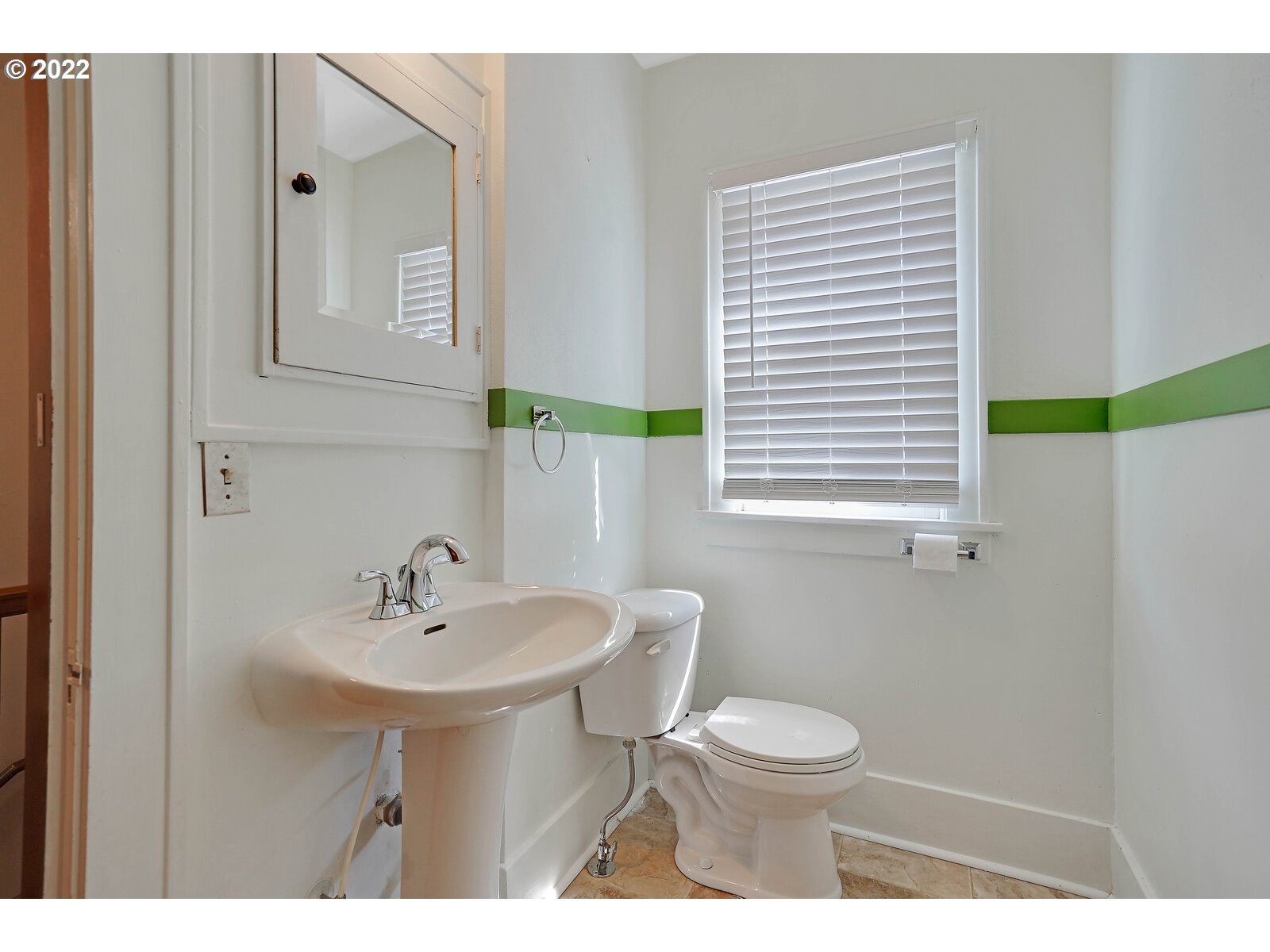 440 17th Street Northeast Salem, OR 97301 - Photo 24 of 32 a bathroom with a sink a toilet and a mirror