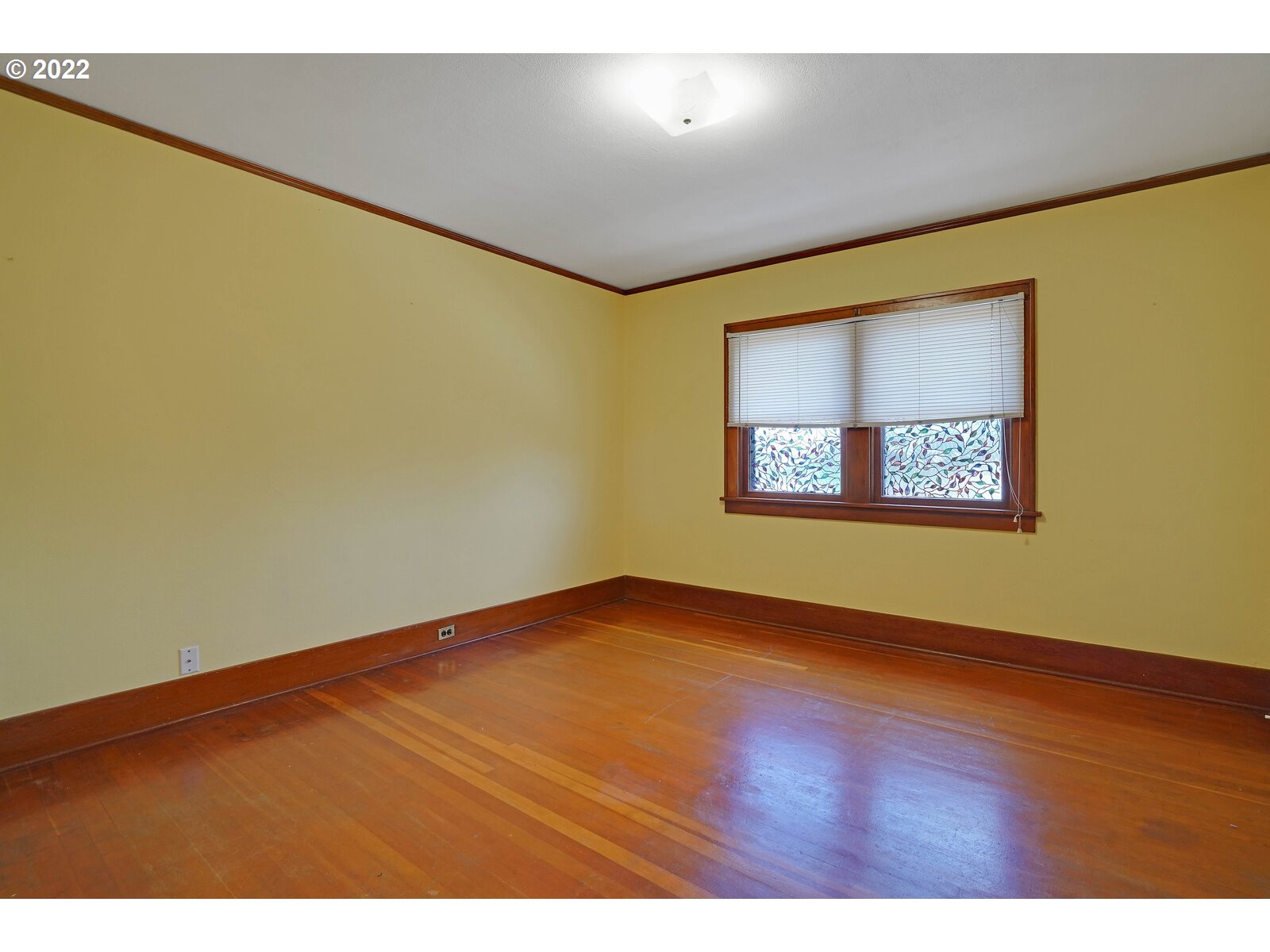 440 17th Street Northeast Salem, OR 97301 - Photo 27 of 32 an empty room with wooden floor and windows
