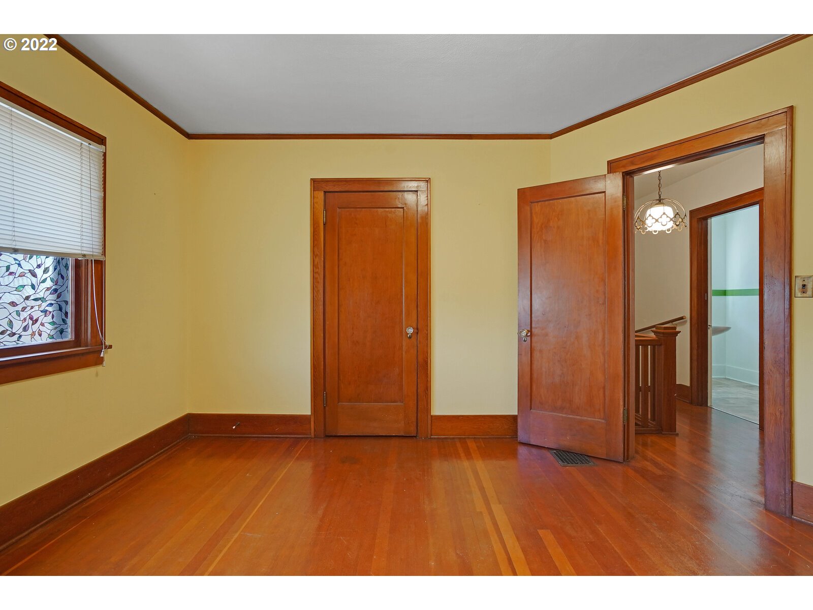 440 17th Street Northeast Salem, OR 97301 - Photo 28 of 32 a view of an empty room with wooden floor and closet