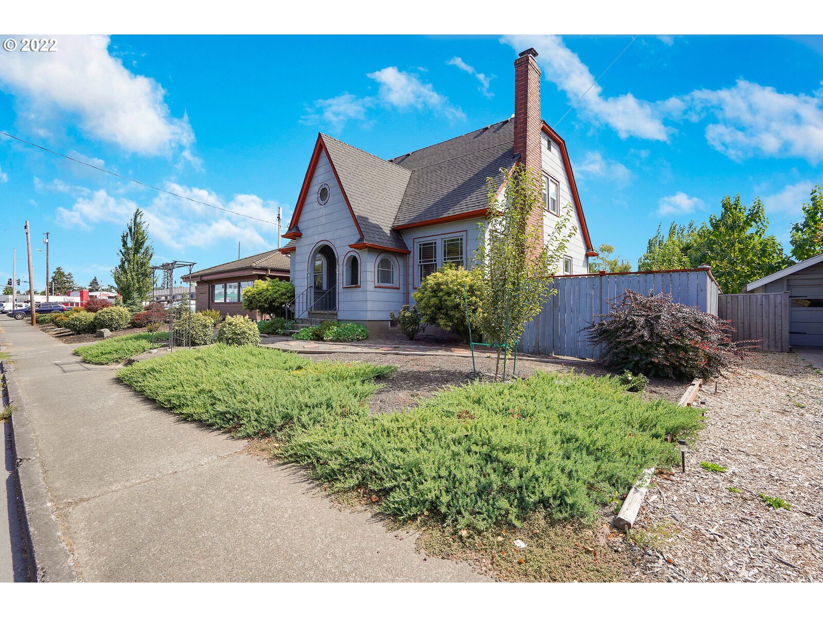 440 17th Street Northeast Salem, OR 97301 - Photo 32 of 32 a front view of a house with a yard and potted plants