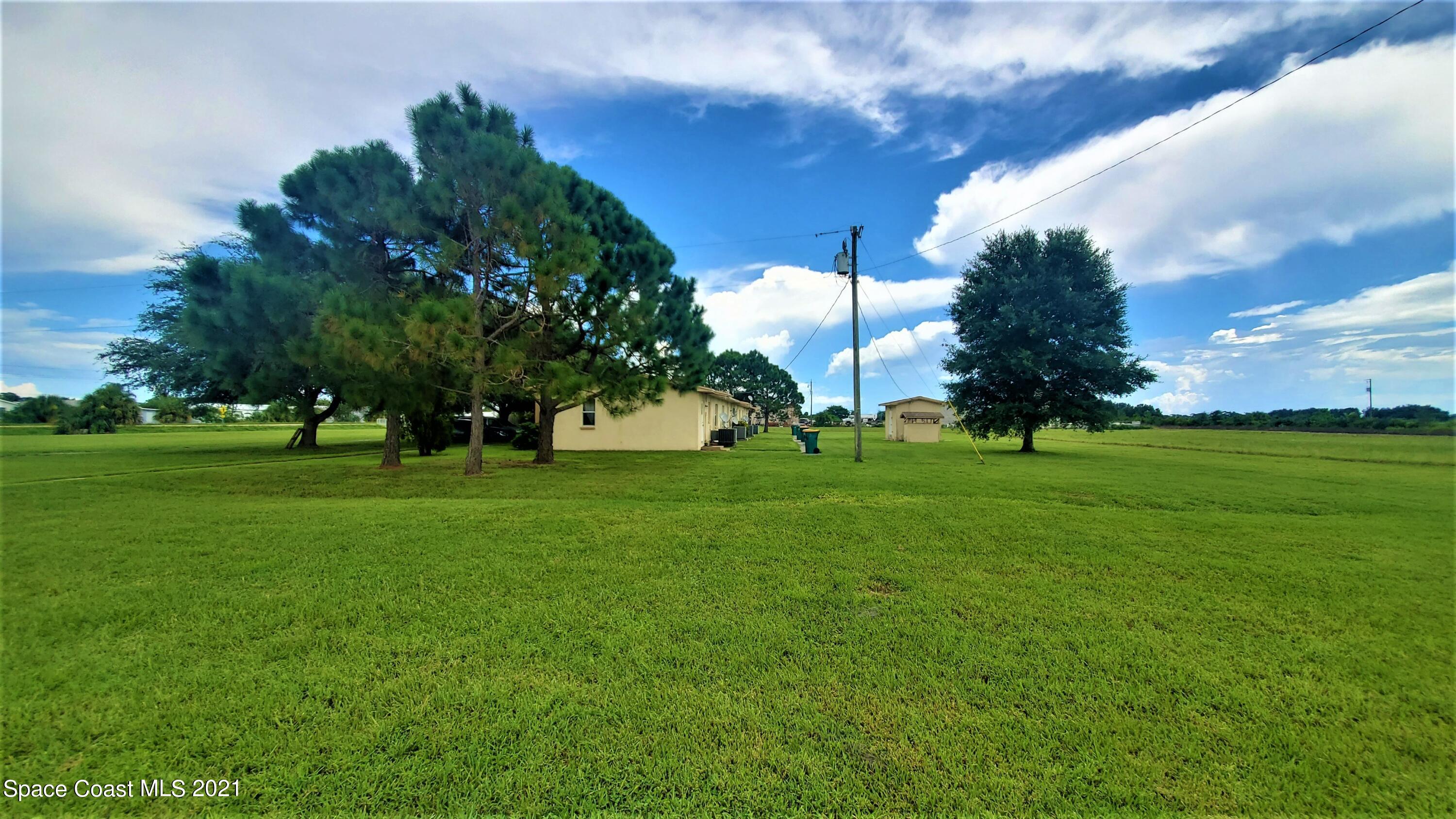 4521 Micco Road Micco, FL 32976 - Photo 8 of 12 a view of a park with tree s