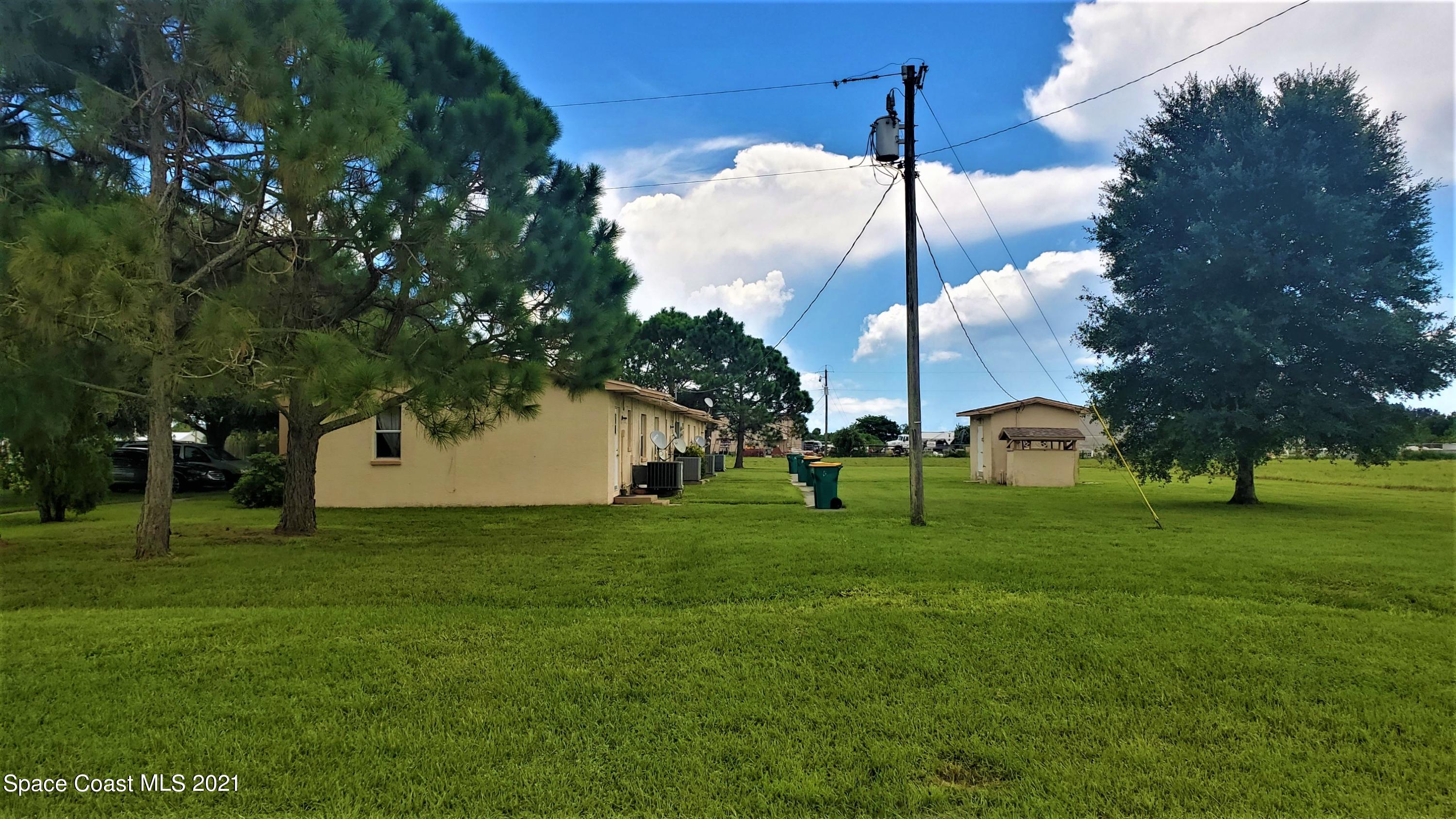 4521 Micco Road Micco, FL 32976 - Photo 9 of 12 a view of a park with a tree