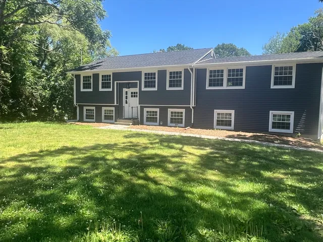 a house view with a garden space