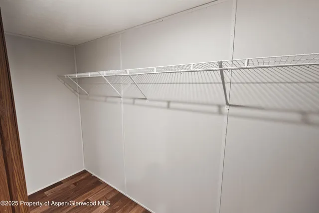 a view of small space with racks on the wall