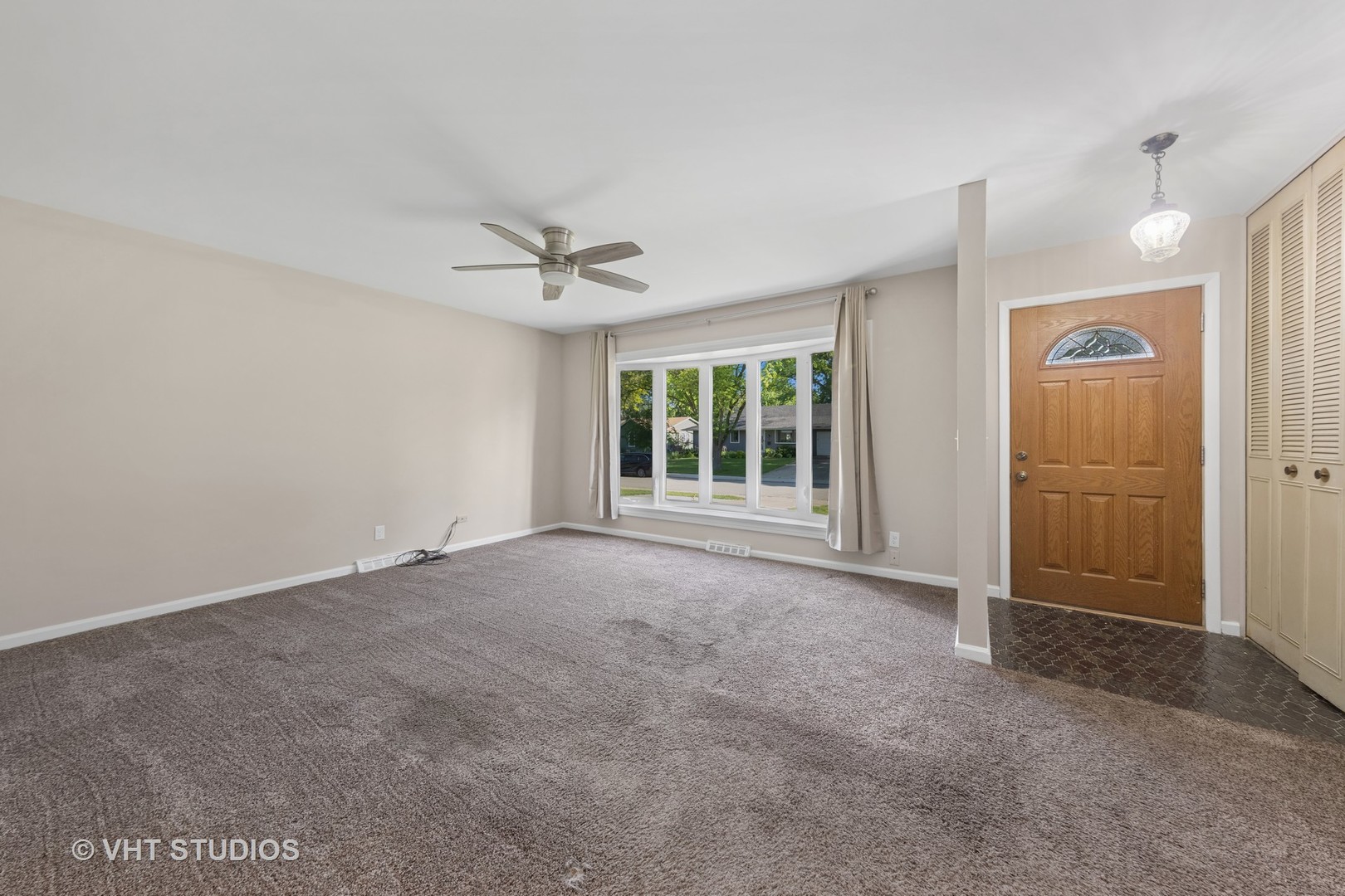 12 Pickford Road Montgomery, IL 60538 - Photo 3 of 29 a view of an empty room with a window