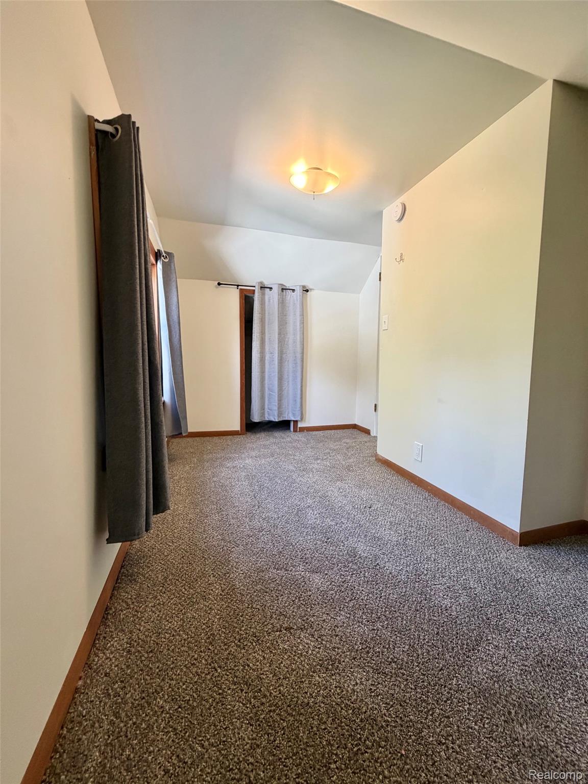 2840 Miller Road Flint, MI 48503 - Photo 34 of 49 Recessed ceiling light fixture, wall-to-wall carpeting, and wood-finish trim