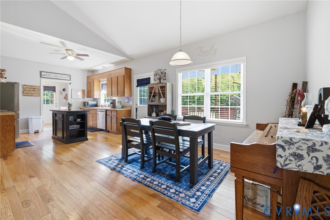 9433 Robin Road Disputanta, VA 23842 - Photo 7 of 26 Open-concept kitchen and dining area featuring woo
